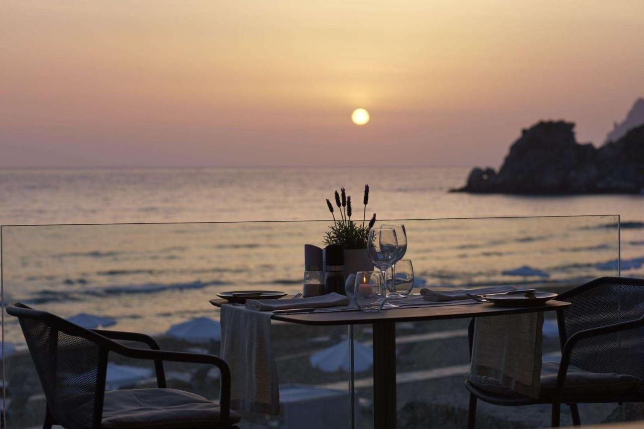 Pelekas Monastery Hotel Exterior foto Sunset at the beach