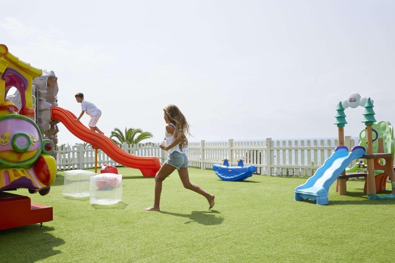 Pelekas Monastery Hotel Exterior foto Children playing on the rooftop of the hotel